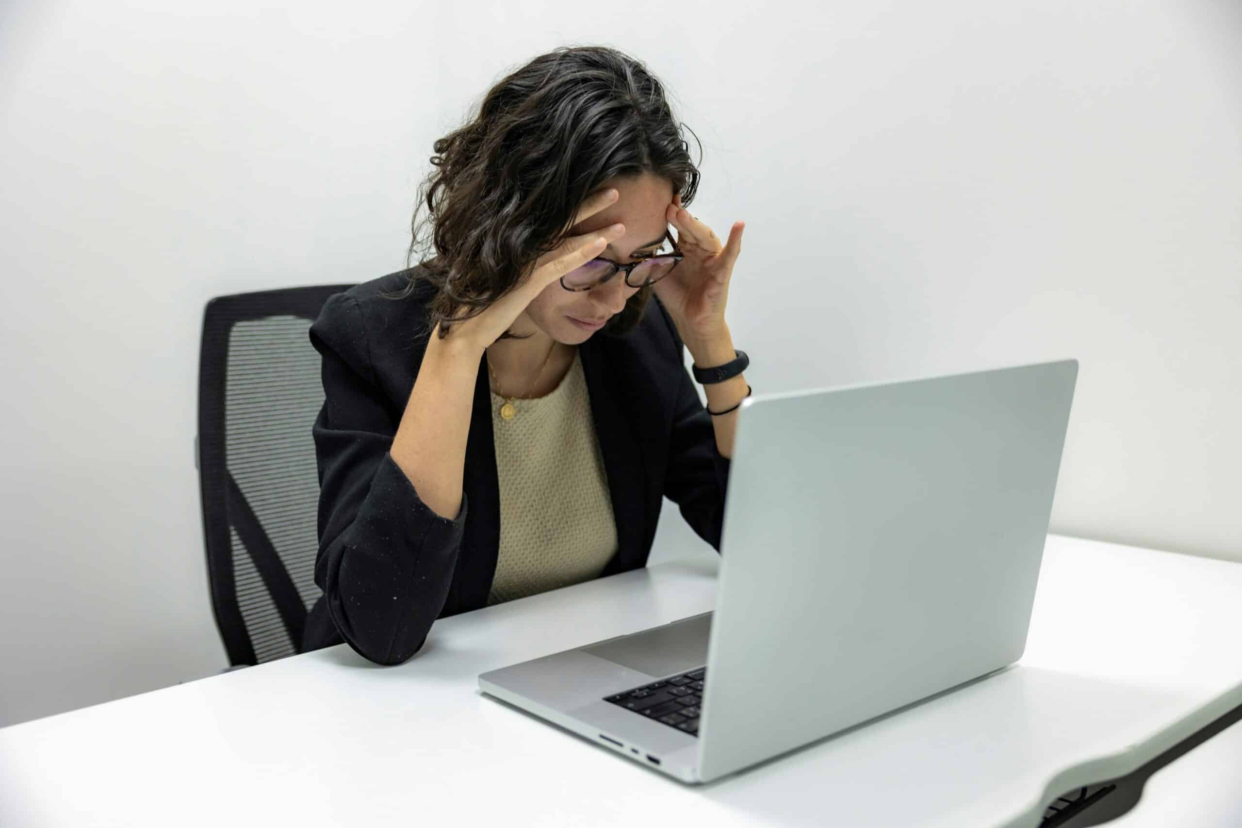 Female businesswoman looking frustrated because she's using HighLevel Software